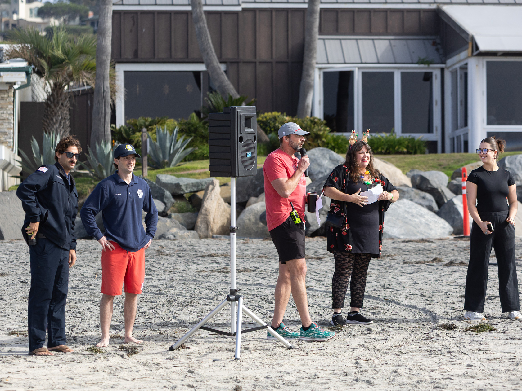 Del Mar lifeguards, race director Anthony Valentino, Dominique Valentino, and...