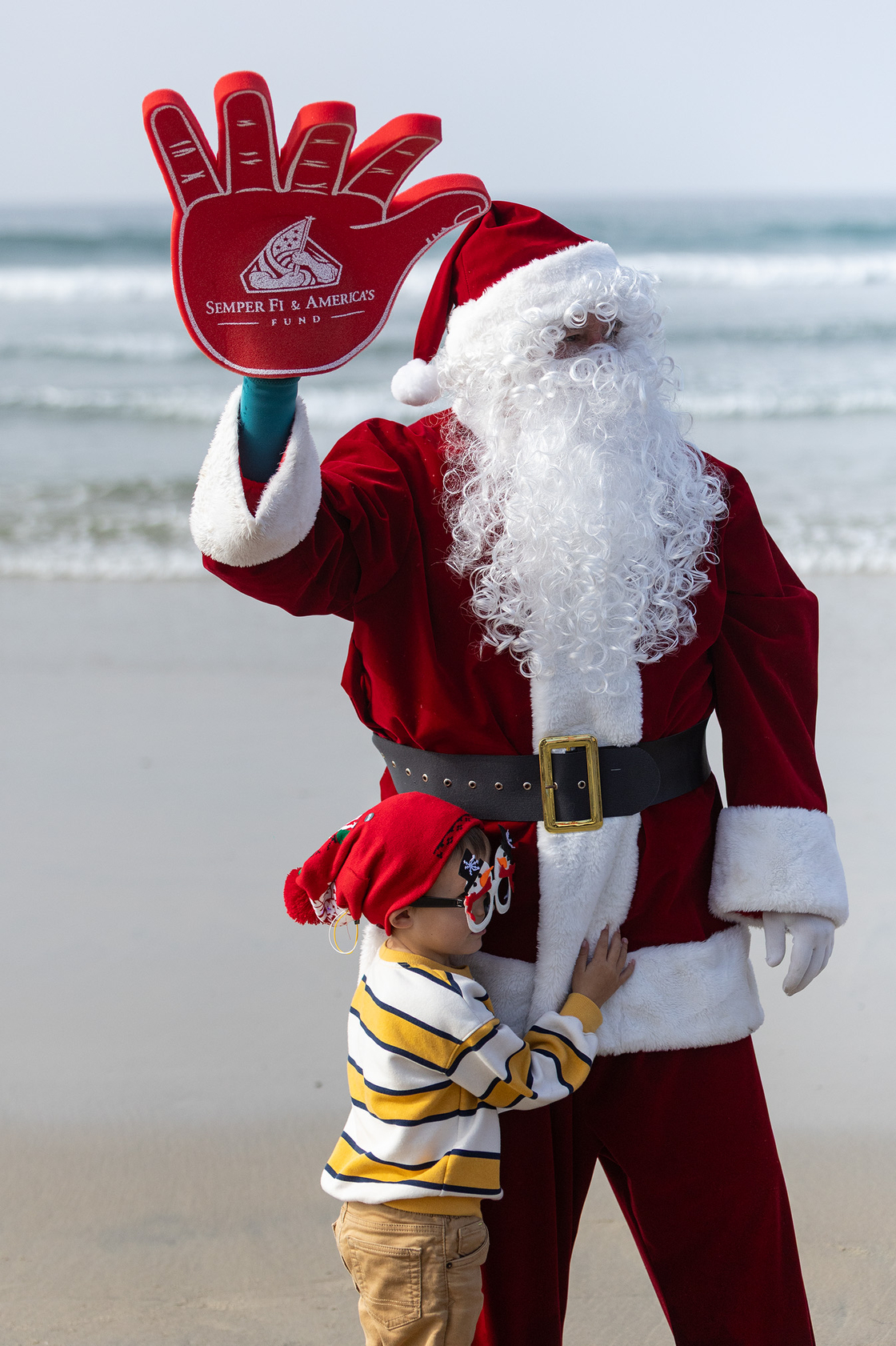 Santa gets a hug from a fan (Jon Clark)