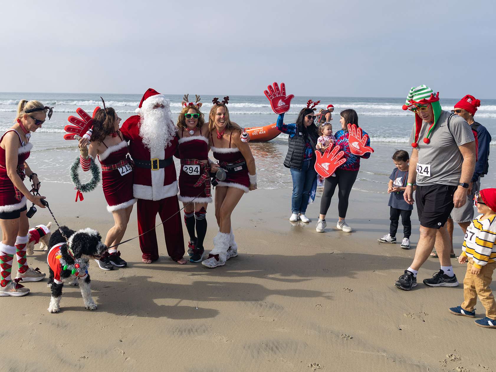 Red Nose Run participants greet Santa when he arrives by...