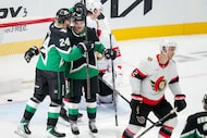 Dallas Stars center Wyatt Johnston (53) celebrates with center Roope Hintz (24) after...
