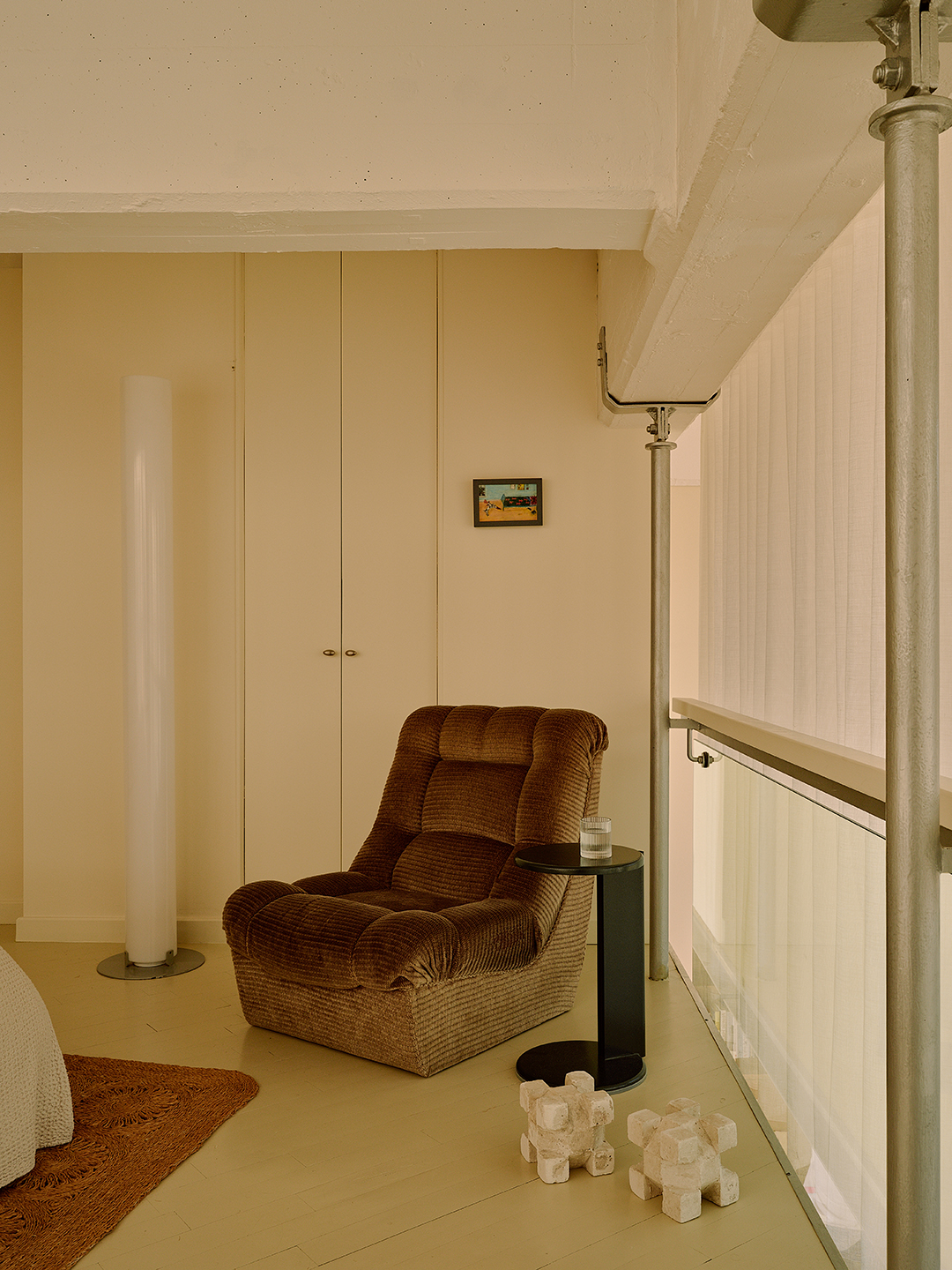 chair in corner of bedroom