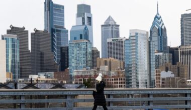 A pedestrian walks walks along the South Street bridge on a cold winter day last week.