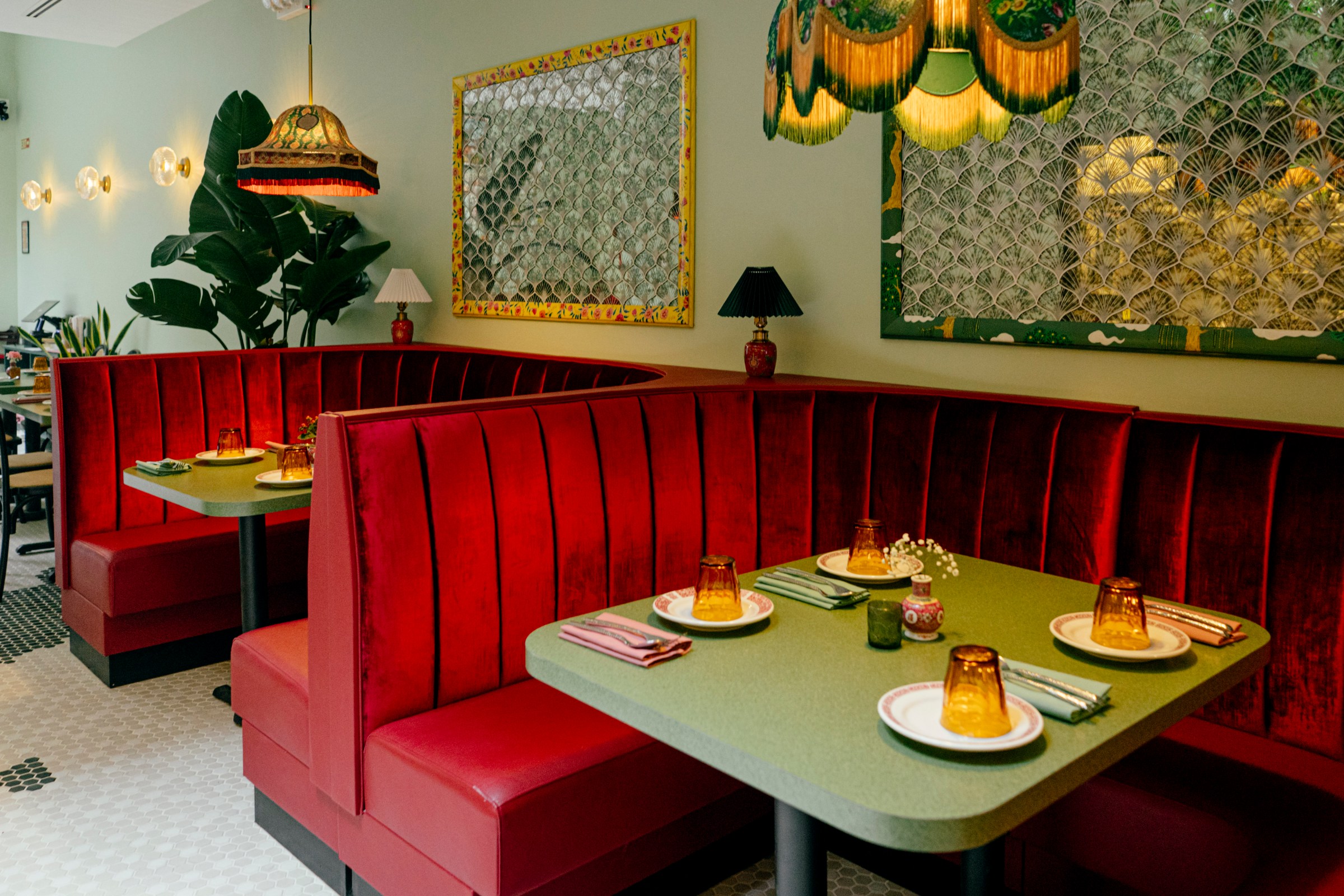 Red booth tables at a restaurant.