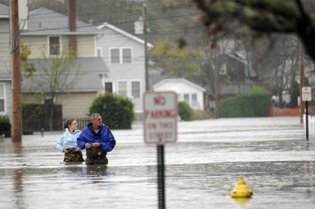 Superstorm Sandy slammed into Connecticut in October 2012, hitting the shoreline with a tremendous storm surge that flooded many low-lying roads., including in Milford. (Courant file photo)