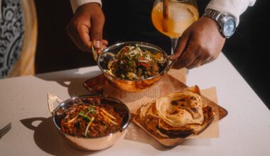 A bowl being placed on a table.