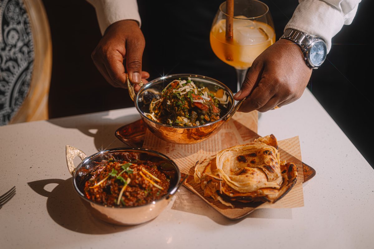 A bowl being placed on a table.