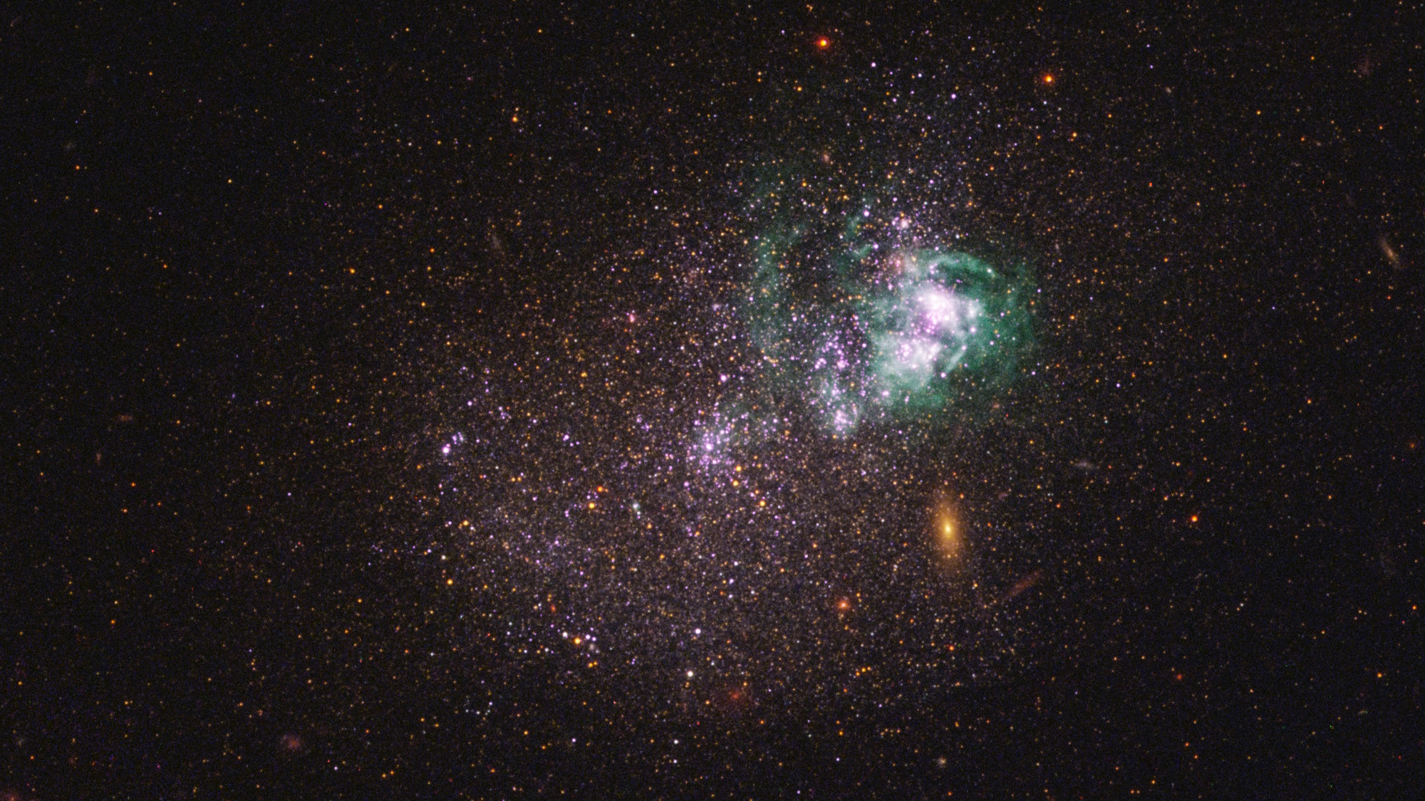 A colorful, irregular galaxy with bright clusters of stars, some possibly from a generation stars before sun, and nebulae against a dark background scattered with distant stars.