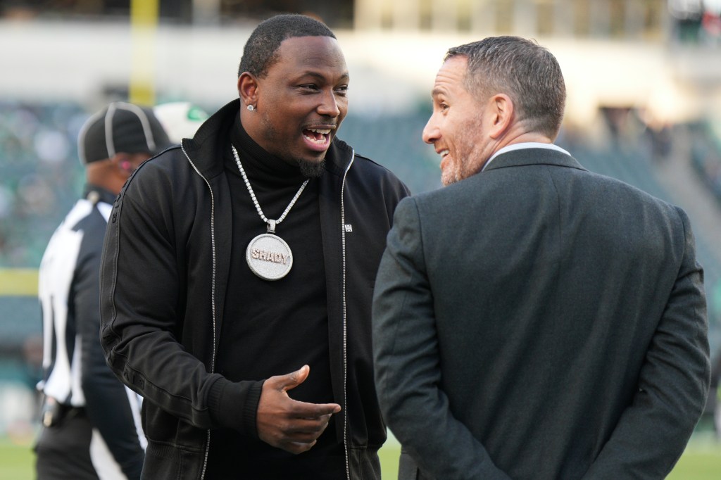 Philadelphia Eagles Hall of Fame running back LeSean McCoy chats with Philadelphia Eagles general manager Howie Roseman during the game between the Philadelphia Eagles and the Jacksonville Jaguars on November 3, 2024 at Lincoln Financial Field in Philadelphia, PA.