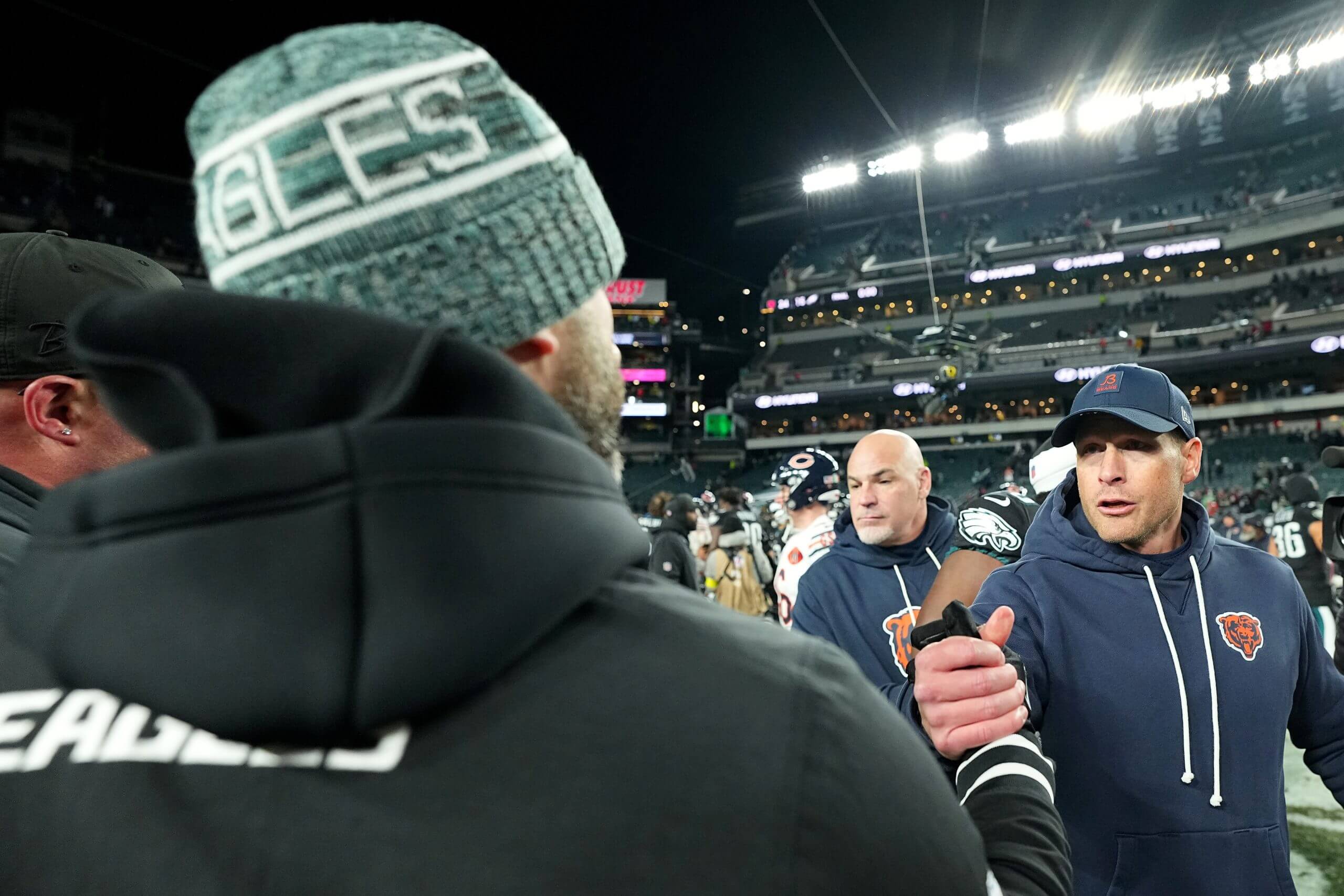 Bears coach Ben Johnson shakes hands with Eagles coach Nick Sirianni after Chicago's win.