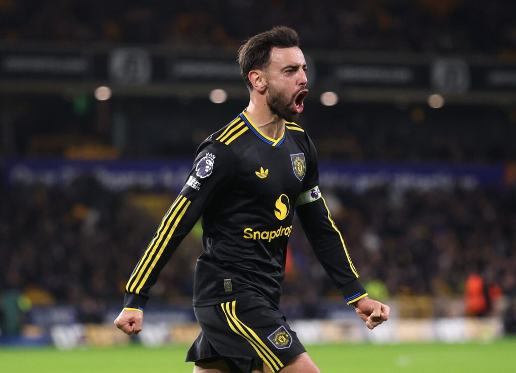Bruno Fernandes celebrates goal for Man Utd, black kit