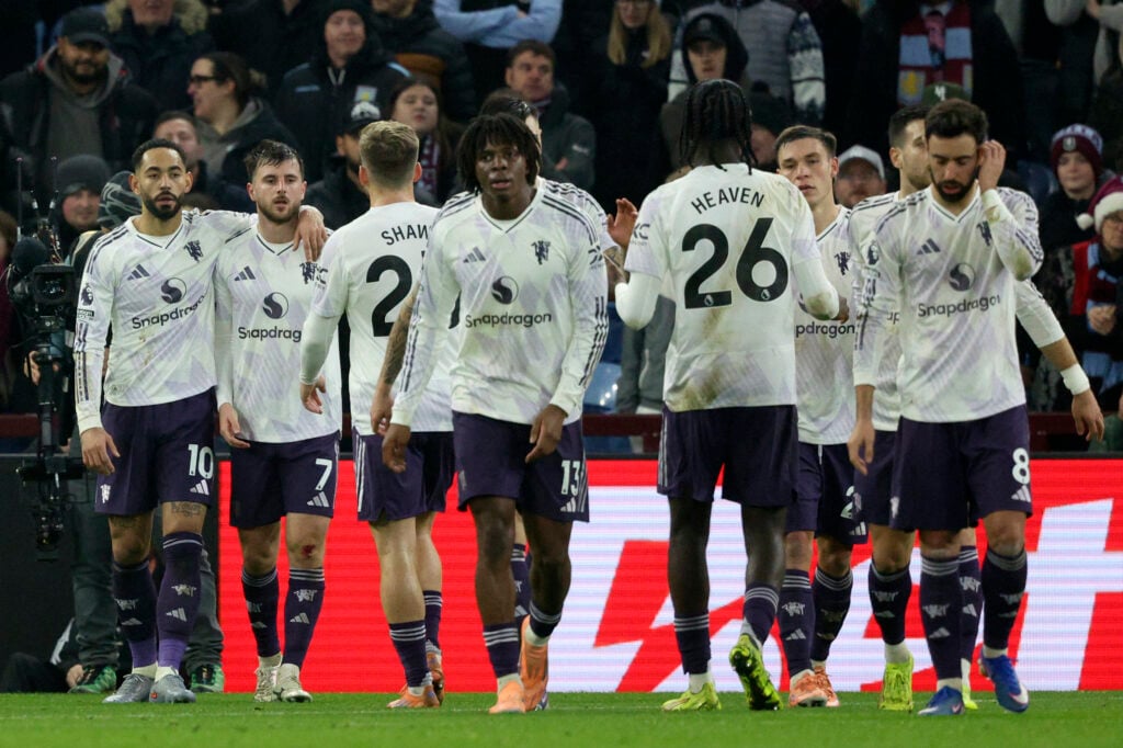Matheus Cunha and Mason Mount with their teammates during the Premier League match between Aston Villa and Manchester United at Villa Park in 2025 in Birmingham, England.
