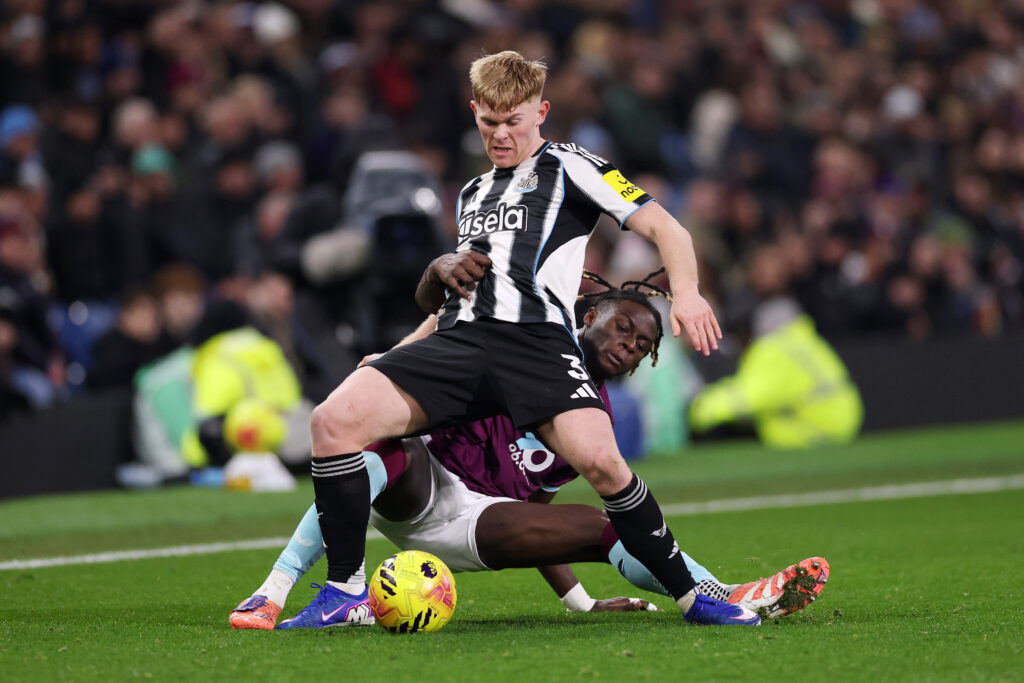 Lewis Hall in action for Newcastle United against Burnley.