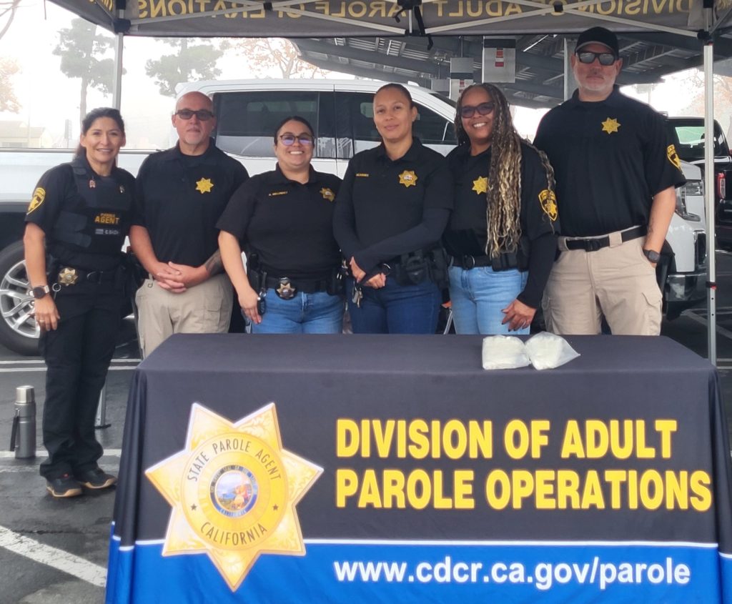 parole agents assist in a gun safety event in San Diego.