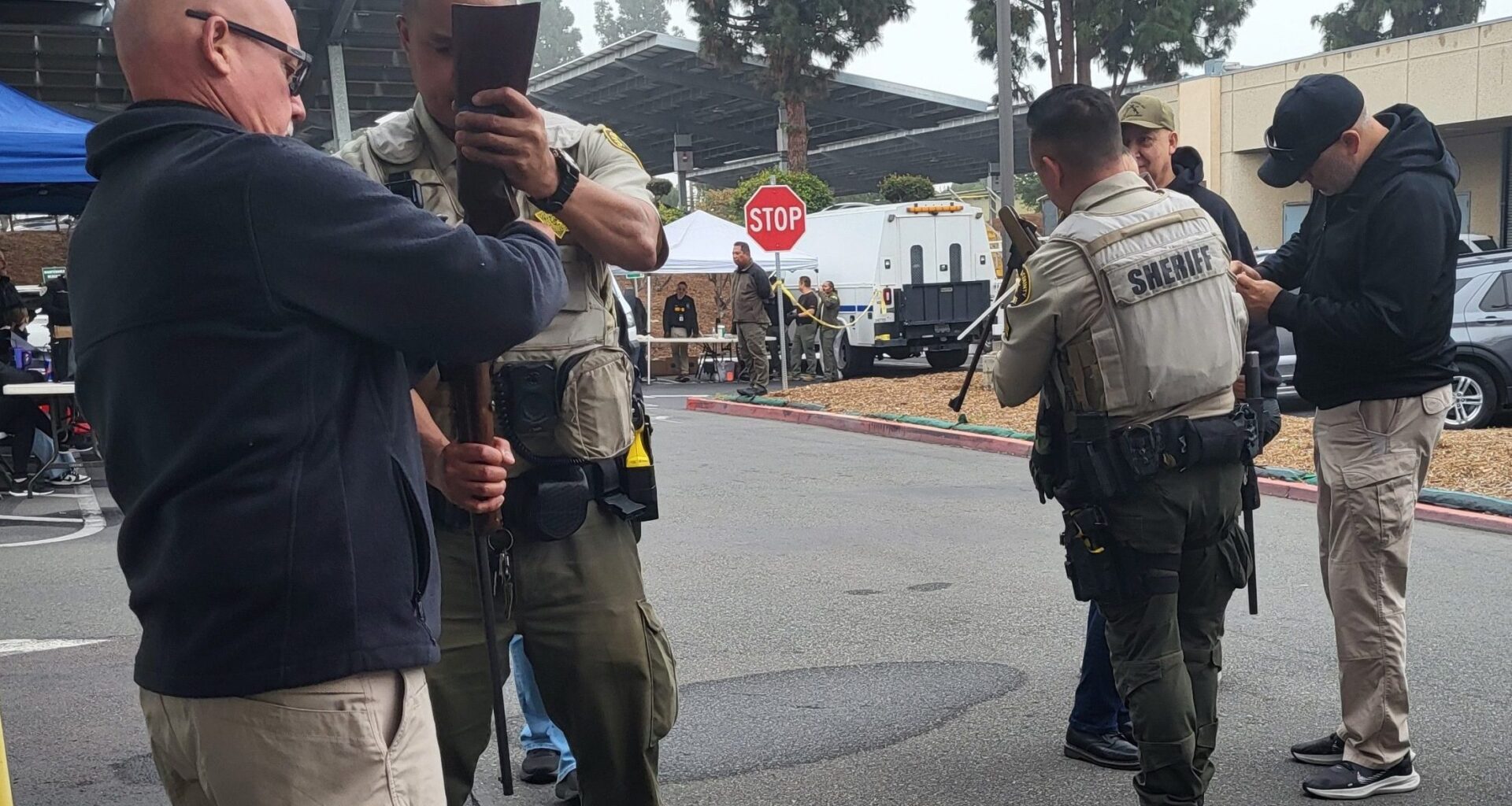 parole agents assist sheriff's office deputies in a gun safety buyback program in San Diego.