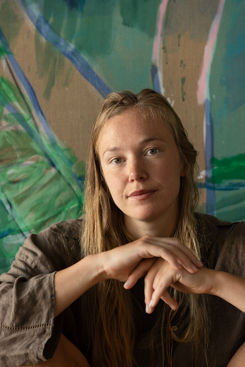 Pam Evelyn with her painting "Watermill" (2025).