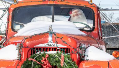 Snow seats on top of a vintage truck with a mannequin depicting Santa Claus at the wheel in Lansdale in December 2020. Ir has been known to snow in December.