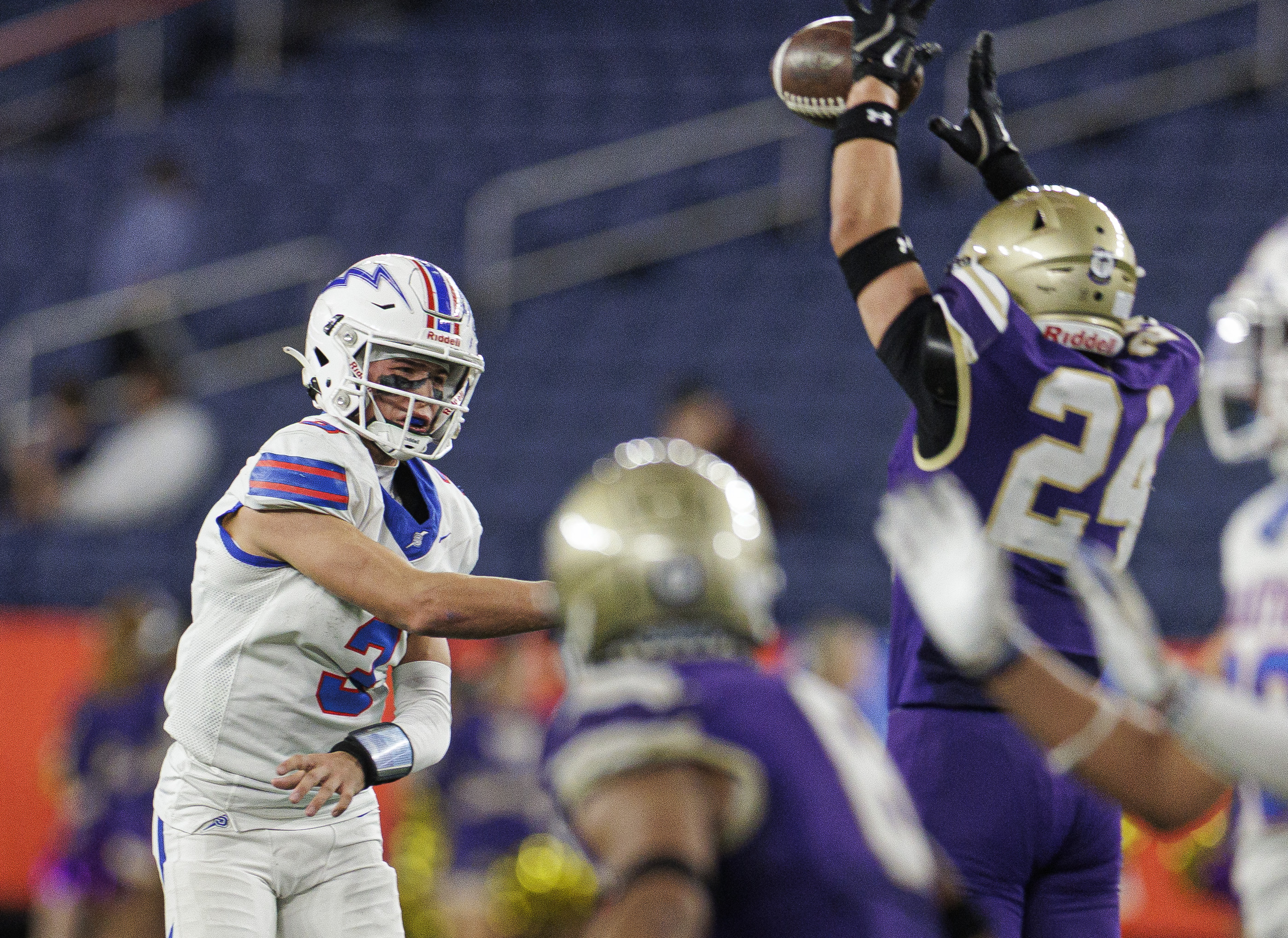 CBA Brothers linebacker Christian Giannone (24) blocks a pass on quarterback Saratoga Springs Blue Streaks Robert Morris (3) as the CBA Brothers and Saratoga Springs Blue Streaks fought for the New York State Class AA state title at JMA Wireless Dome Saturday, December 6, 2025. (N. Scott Trimble | strimble@syracuse.com)