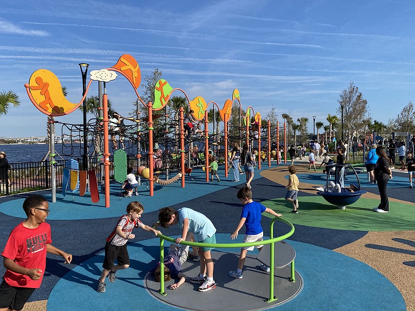 Children play Nov. 24 at RiversEdge public parks on the Downtown Jacksonville Southbank. It is the site of the former site of the JEA Southside Generating Plant, which operated from 1947 to 2001. Children play Nov. 24 at RiversEdge public parks on the Downtown Jacksonville Southbank. It is the site of the former site of the JEA Southside Generating Plant, which operated from 1947 to 2001.