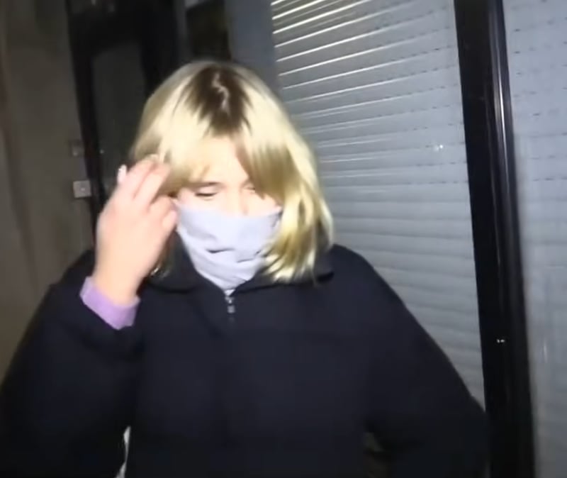 Luiza Rozova, 22, briefly brushed her bangs to the side and gave a glimpse of her face.