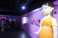 Invitees go through multiple rooms inside the Squid Game immersive experience during a tour...
