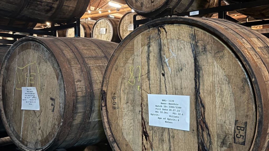 Future batches of Half Acre Beer Co.'s annual Benthic stout rest in barrels inside the Bowmanville brewery, 2050 W. Balmoral Ave., on Dec. 4, 2025. The barrels pictured here have been aging the stout for more two years.