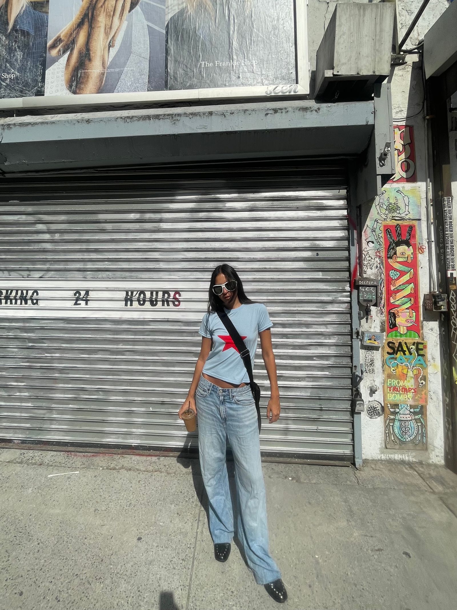 Image may contain Clothing Pants Jeans Footwear Shoe Person Teen Adult Pedestrian and Cup