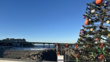 The pier remains closed. Seen here in the distance from the annual 40 ft crooked star pine Christmas tree at the end of Newport Avenue, Ocean Beach, Calif., December 7, 2025. 