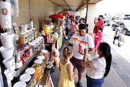Customers shop at Garibaldi Bazaar in Dallas, TX, on Jul 14, 2024. (Jason Janik/Special...