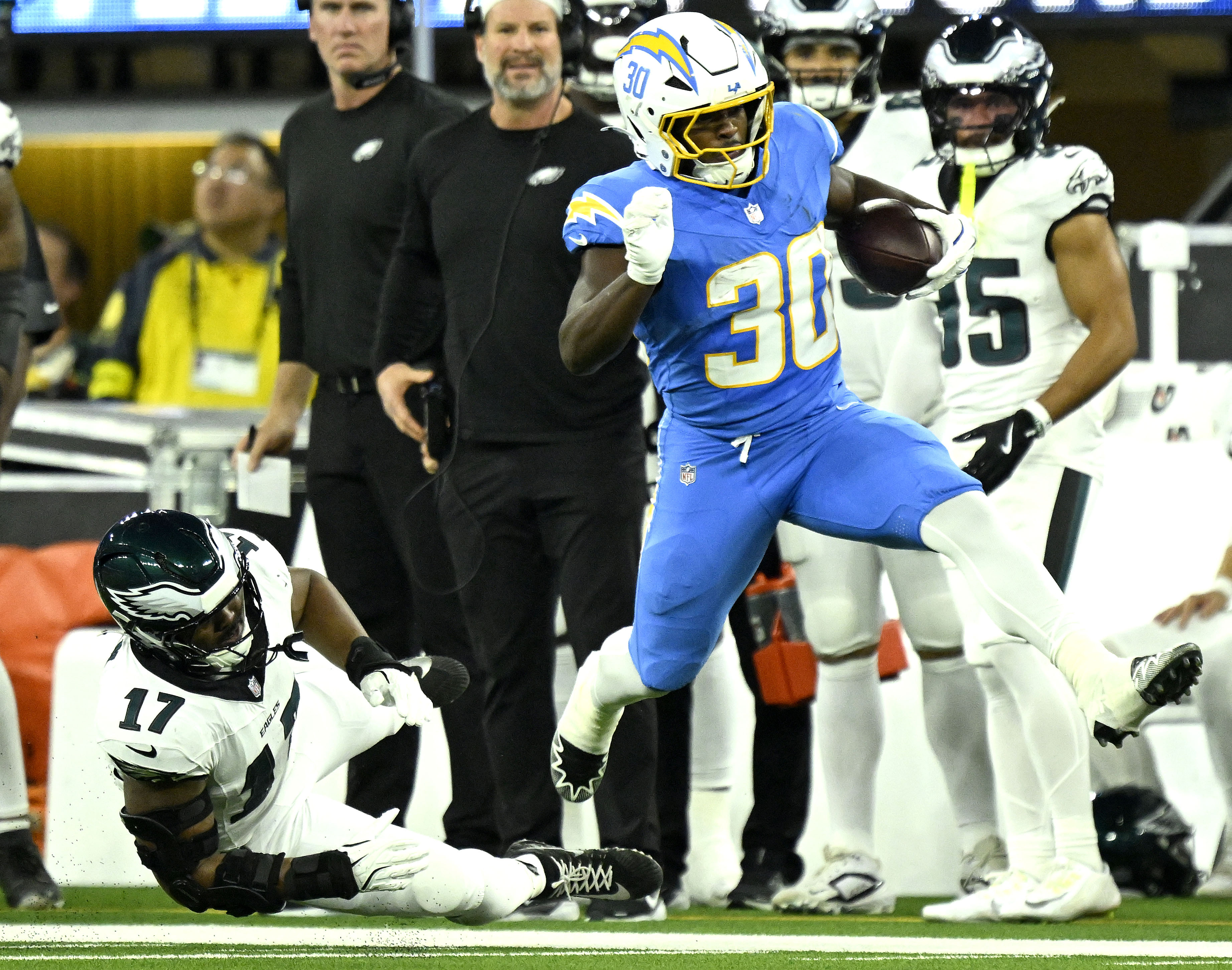 Chargers running back Kimani Vidal breaks away from Philadelphia Eagles...
