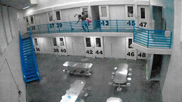Micky Payne throws Mark Spratt over a handrail at Cois M. Byrd Detention Center in French Valley in January 2023. (Courtesy of Riverside County Sheriff's Department)
