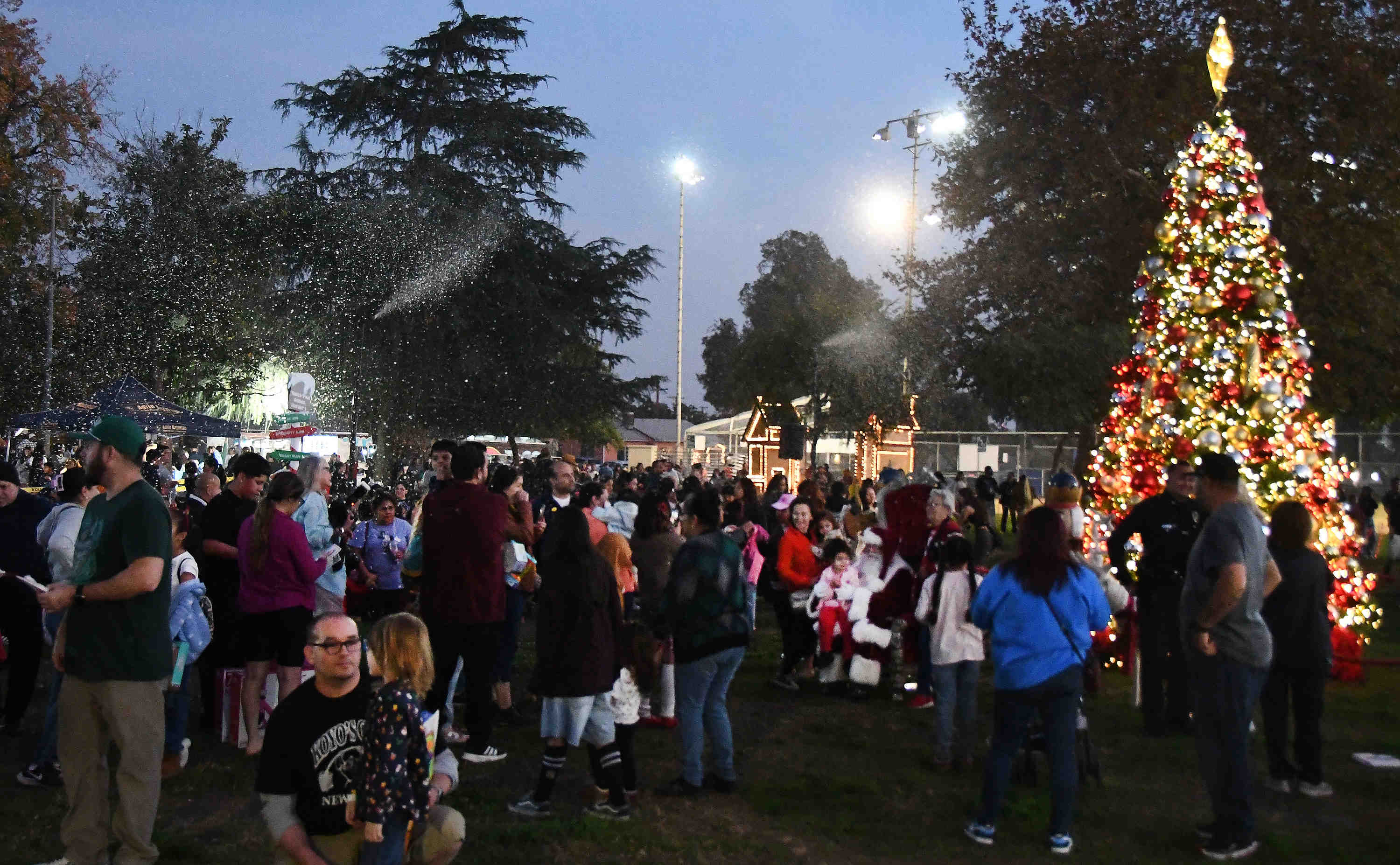 Kids line up to see Santa at the free toy...