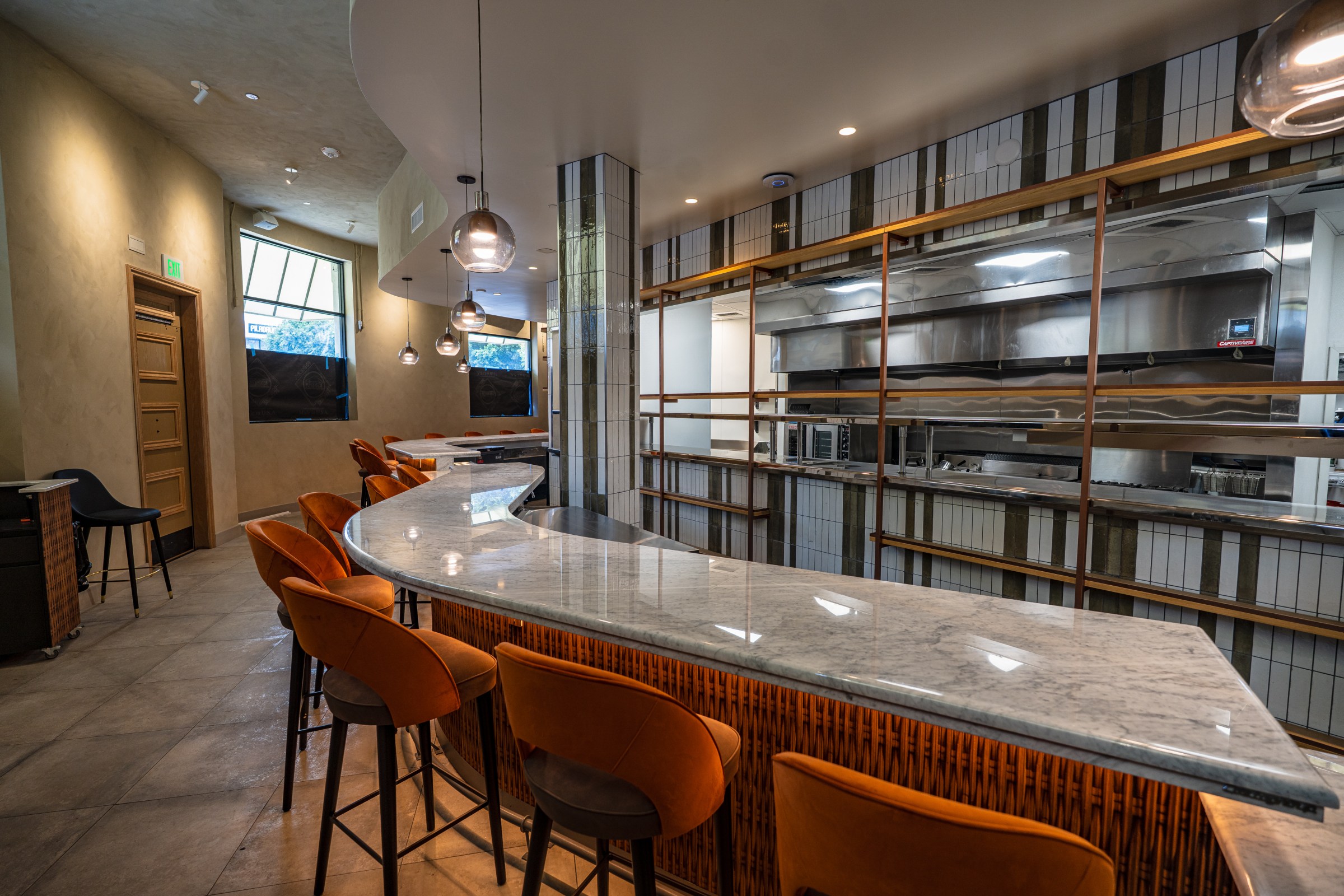 Interior of Lapaba with a granite counter in Koreatown.