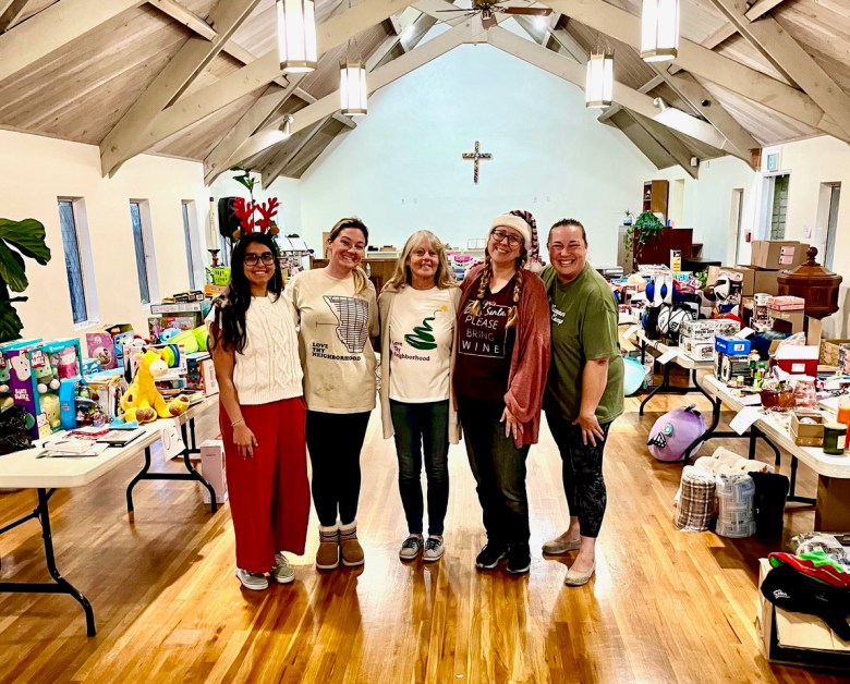 Volunteers for the Love Thy Neighborhood Joy Drive are Celeste Calderon, Raquel Freischlag, Donna Titus, Stasi McAteer, and Holly Strum. (Photo courtesy of Love Thy Neighborhood)
