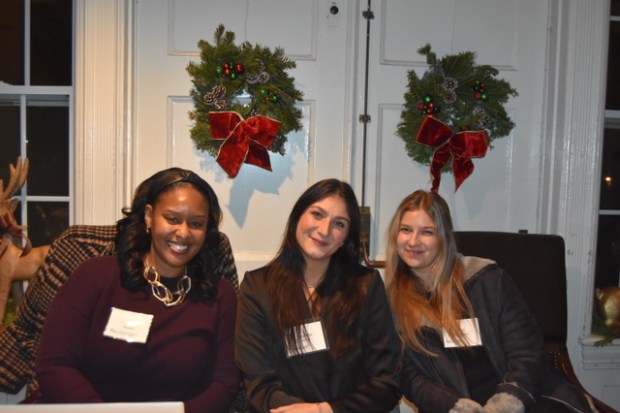 Children's hospital employees, Channell Mauldin, Sophia Rabbat and Julie Garaschenko greet attendees at the door. (Photo by Maggie Corcoran)