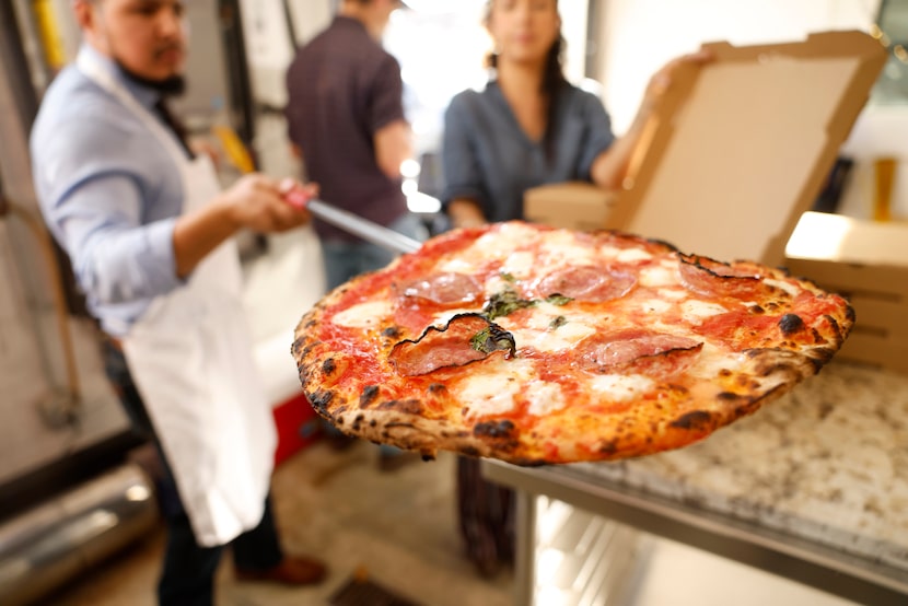 Most of Felina's pizzas will be thin crust, like this one with pomodoro, hot soppressata,...
