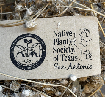 Cardboard sign that says Native Plant Society of Texas San Antonio