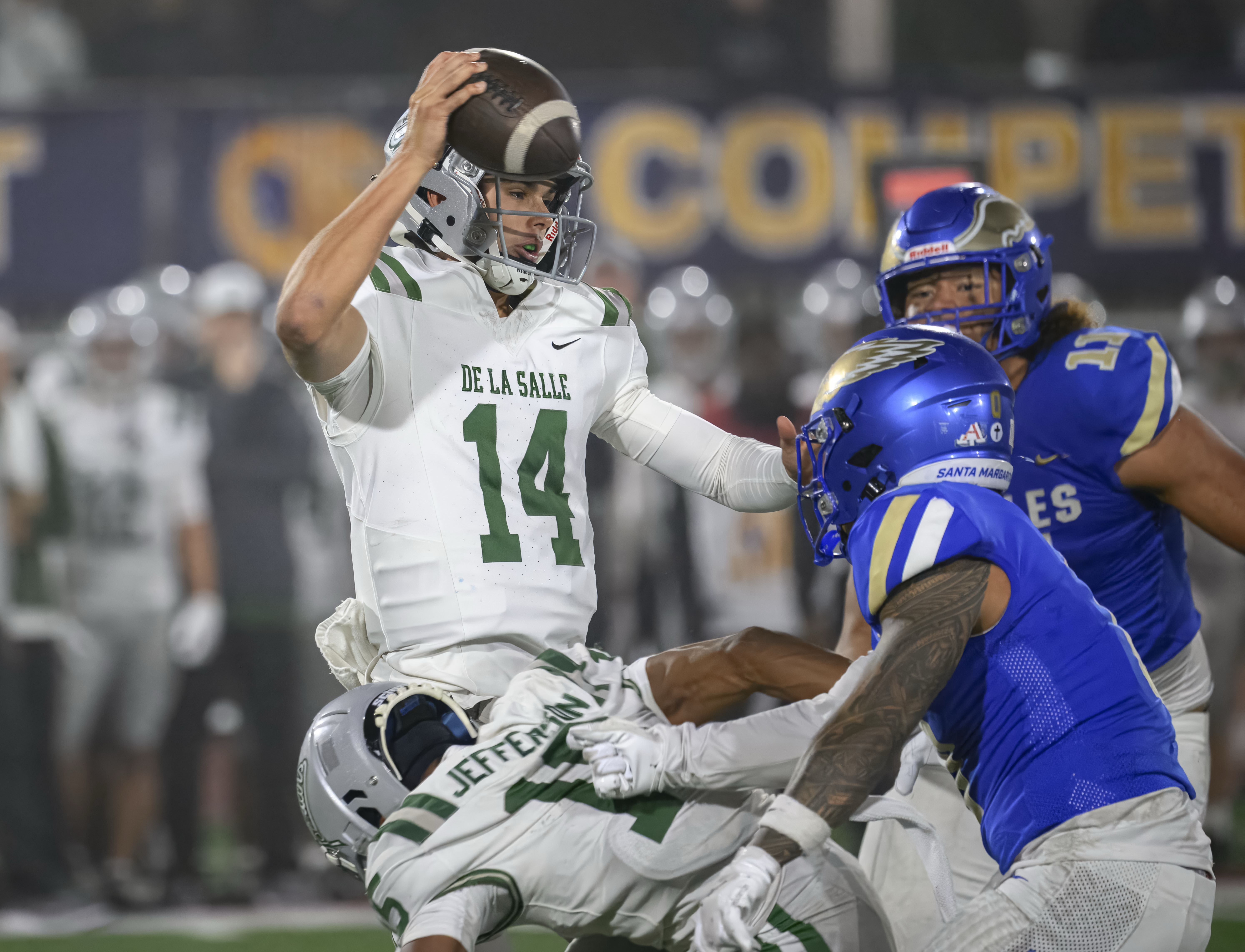 De La Salle quarterback Brayden Knight runs into Santa Margarita...