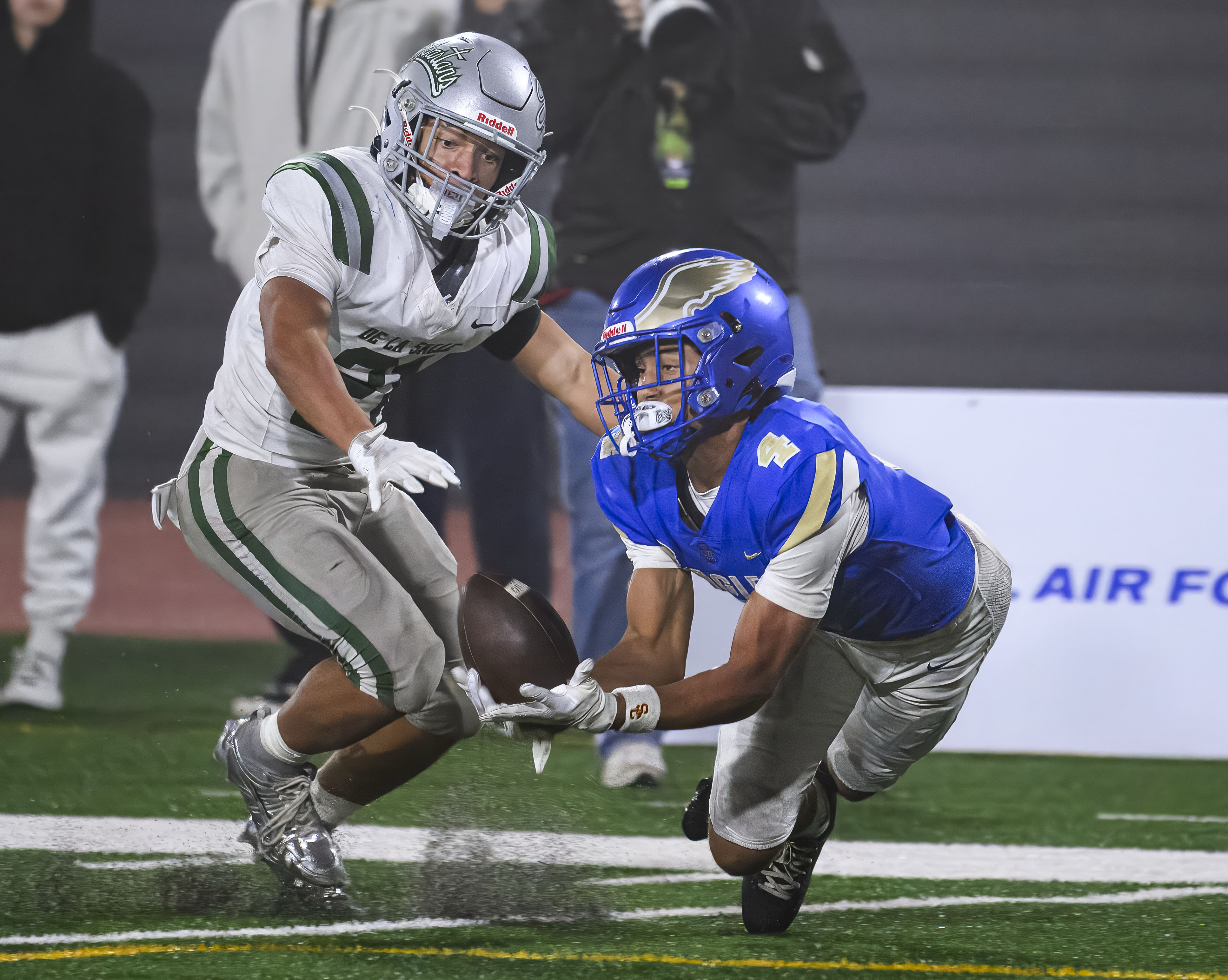 Santa Margarita wide receiver Trent Mosley, right, makes the reception...
