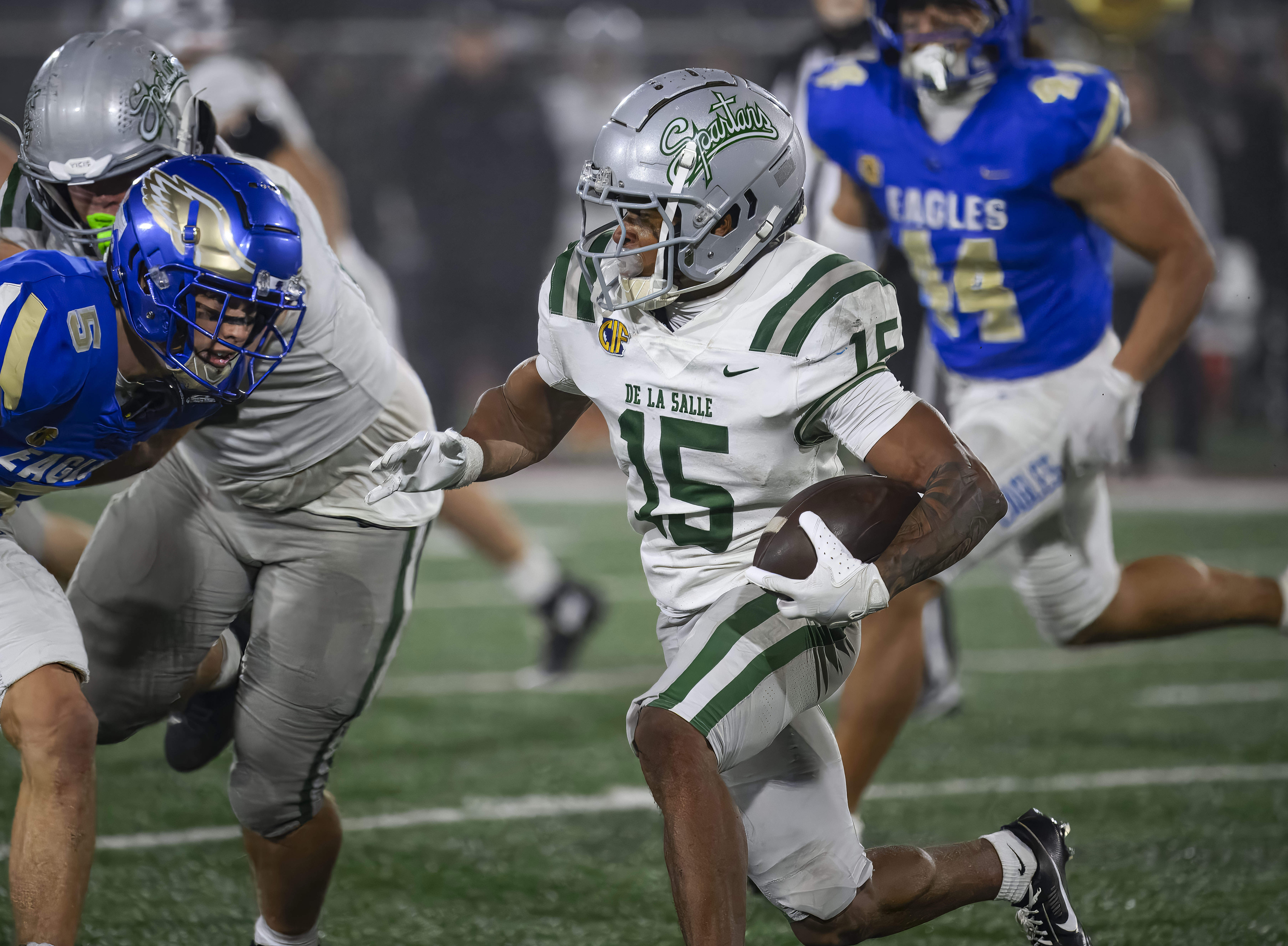 De La Salle running back Jaden Jefferson, right, tries to...