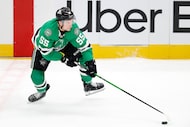 Dallas Stars defenseman Thomas Harley (55) gathers the puck during the second period against...