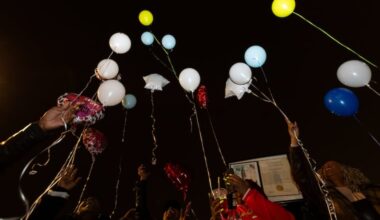 Balloons with messages written on them launch after the 25th anniversary of the Lex Street massacre recognition ceremony at Lucien Blackwell Community Center on Sunday, Dec. 28, 2025, in Philadelphia.