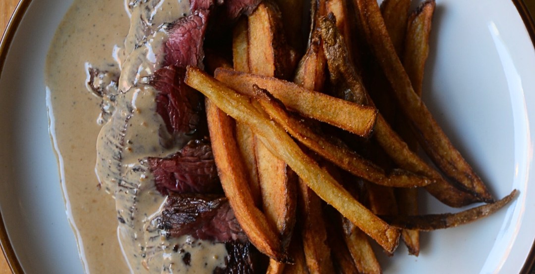 An Eclectic ‘90s-Era Cafe Scales Up to Serve Dinner in Columbus Circle