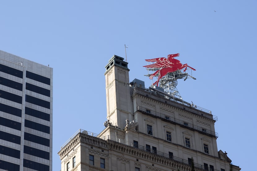 A Red Pegasus is perched atop of the Magnolia Hotel at 1401 Commerce St. in downtown Dallas...