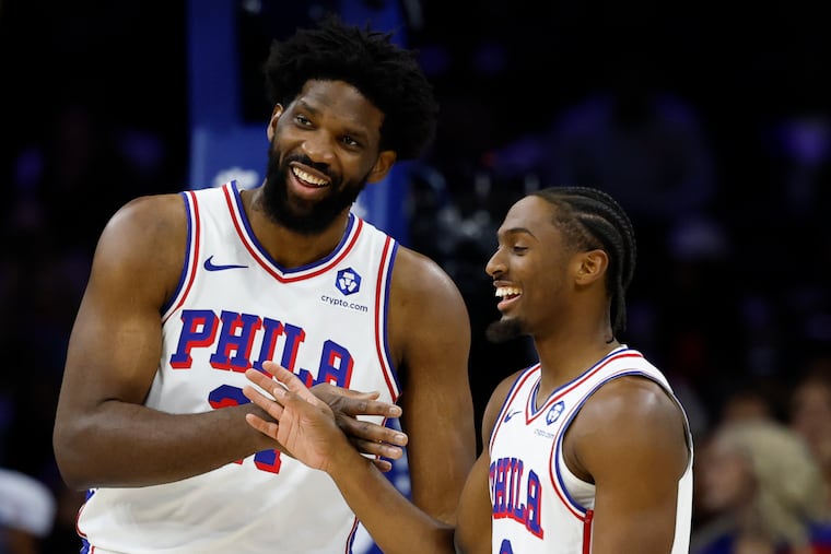 Sixers center Joel Embiid with guard Tyrese Maxey. The Sixers are back in action tonight against the New York Knicks.