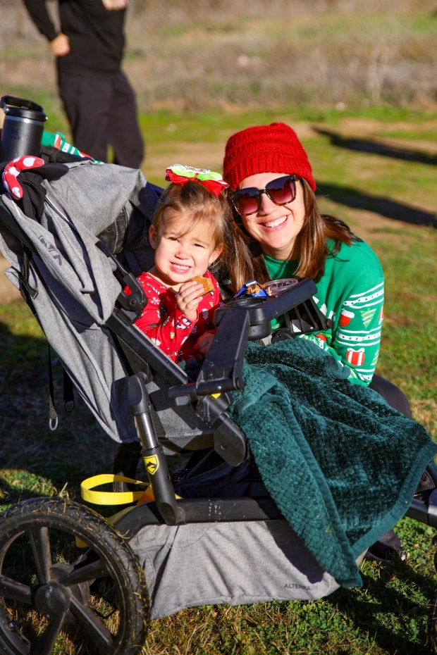 Ramona High School Assistant Principal Brittany Workman and her daughter, Charlotte, participate in the First annual Candy Cane Run 5K event on Dec. 4. (Katherine Pendergraph)