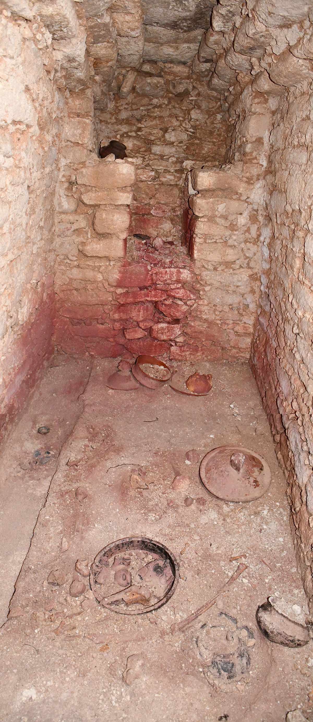 The lower portion of the north wall of the chamber was coated in bright red cinnabar, a sacred mineral reserved for the burials of the highest-ranking Maya royalty.