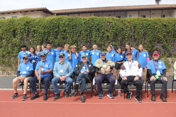 R. Roger Rowe School jogathon fifth grade leaders with a group of veterans. (Karen Billing)