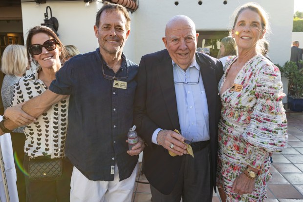 Jill and Cutter Clotfelter, Craig Clark, Deana Ingalls at the celebration of the new centennial donor wall at the RSF Historical Society's La Flecha House.(Jon Clark)