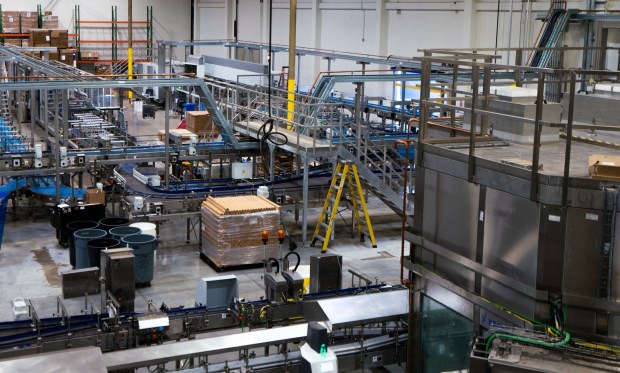The canning line at the Athletic Brewing Company facility in Miramar, Tuesday Nov. 11, 2025, in San Diego, California, can run at 1,200 cans per minute. Their beers are non-alcoholic with less than 0.5% of alcohol by volume. Howard Lipin / For The San Diego Union-Tribune....NOTE: There wasn't any activity on the canning line.