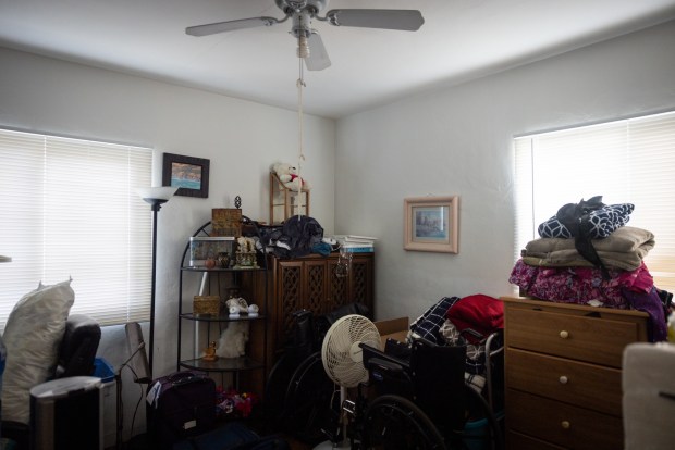 Jo is in the habit of keeping the blinds of her San Diego home closed at all times after cameras captured her son, Ed, repeatedly violating restraining orders in 2025. (Ana Ramirez / The San Diego Union-Tribune)